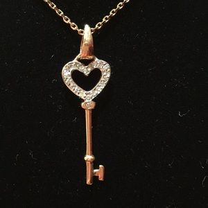 14 Kt BNWT diamond key on a 18” 14kt chain